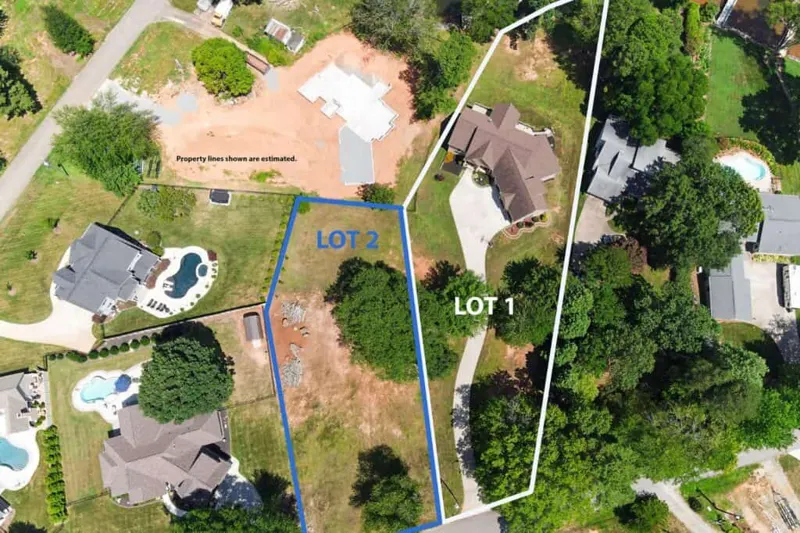 Aerial photo with enhanced property lot lines drawn over two parcels